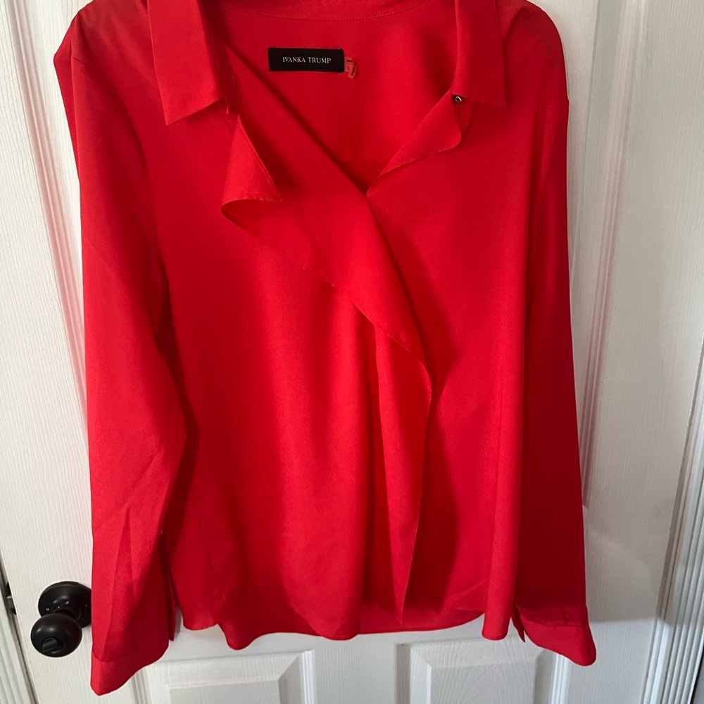 Ivanka Trump hot Coral orange color blouse.  Large